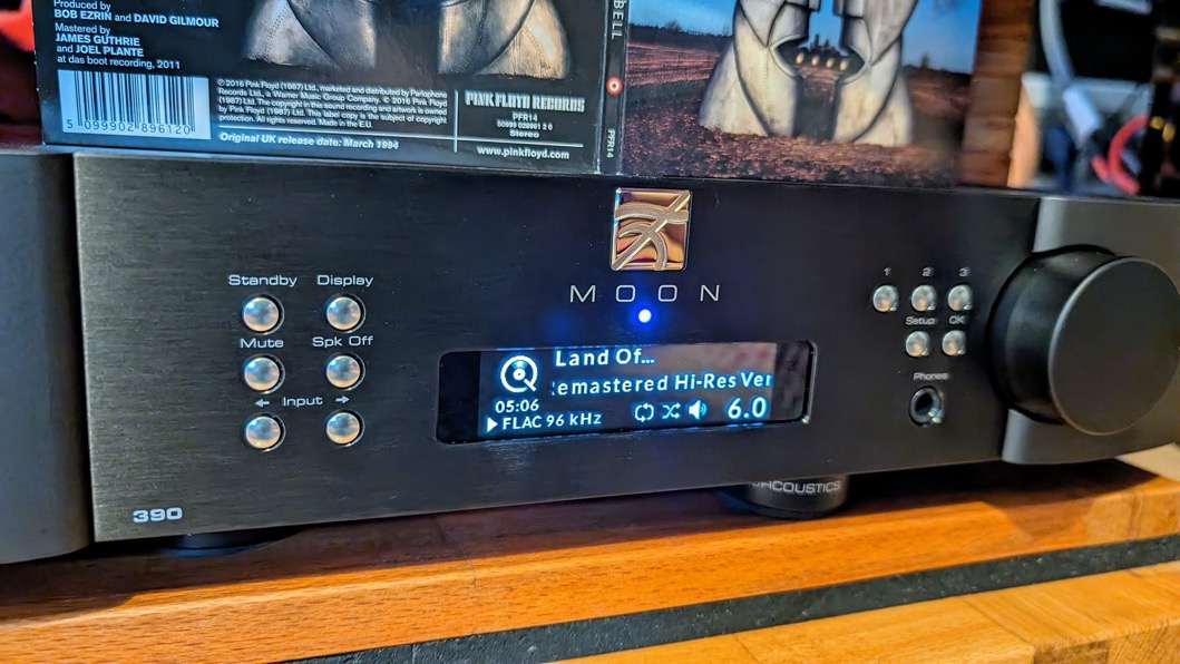 A black electronic device with buttons and a display

Description automatically generated